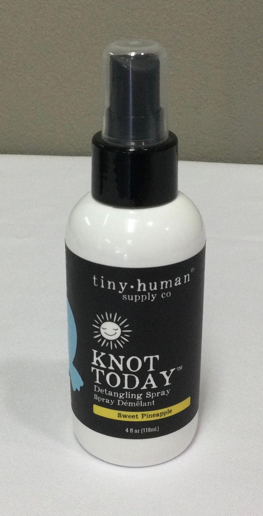 Tiny human detangling spray